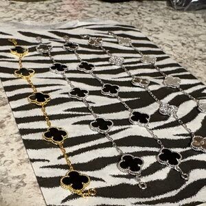 Van Cleef & Arpels Black and Gold Clover Bracelet